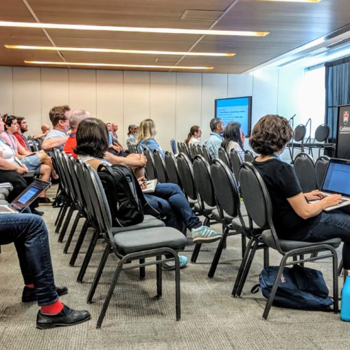 people witting in lecture